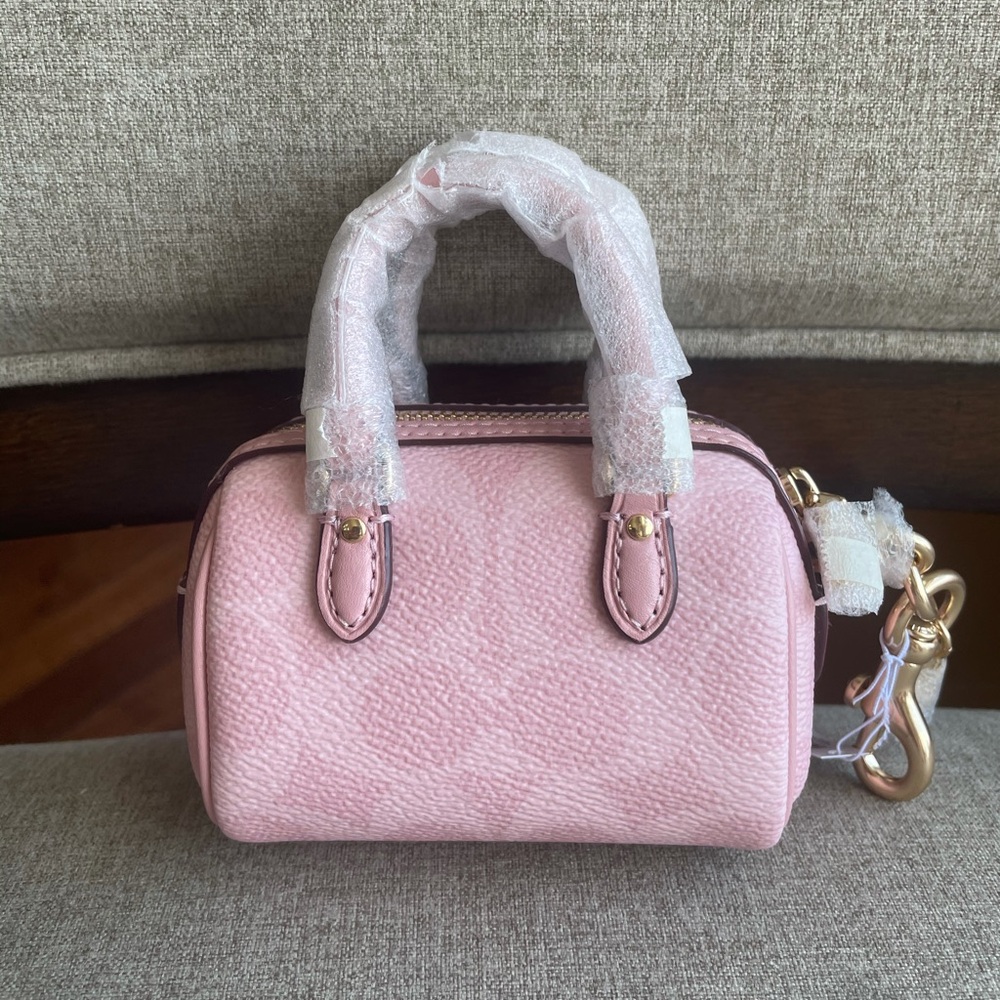 NWT!COACH MINI ROWAN BAG CHARM IN SIGNATURE(COACH CX068)POWDER PINK fastshipping - Picture 2 of 5